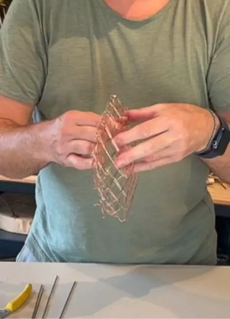 Shape the wire into a circle