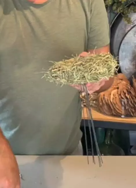 Bend the stick wires in the centre and place in the bouquet